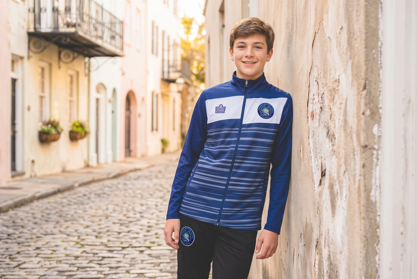 Charleston City FC players wearing navy Durham jackets